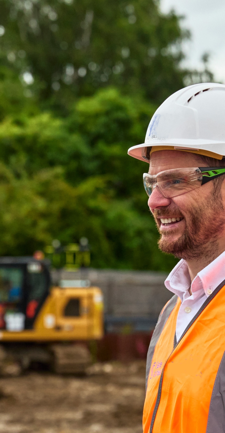 Man looking across construction site