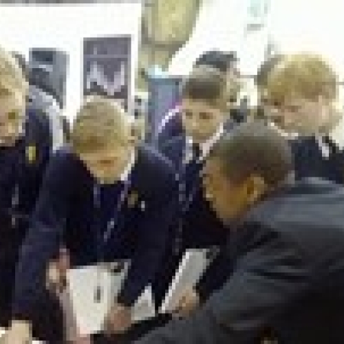 Calvin with students - thumbnail.jpg