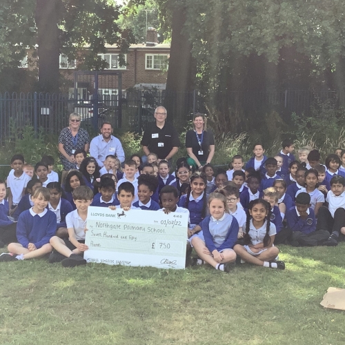 Cheque presentation - large group.jpg