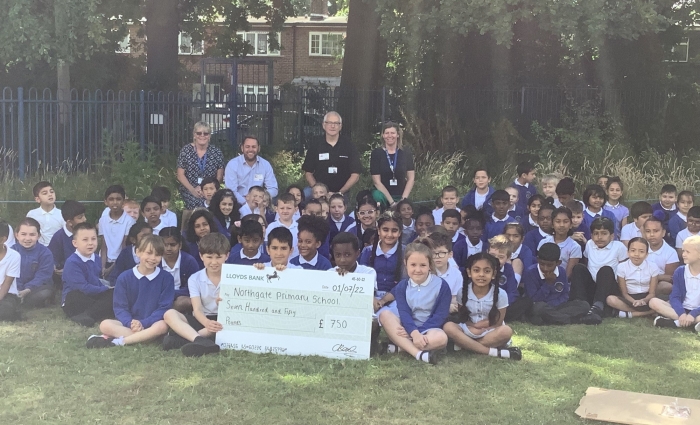 Cheque presentation - large group.jpg