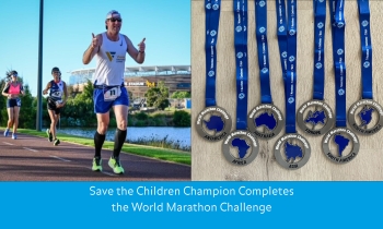 Dennis Cormican running the World Marathon Challenge WMC with his collection of medals which raised money for Save the Children