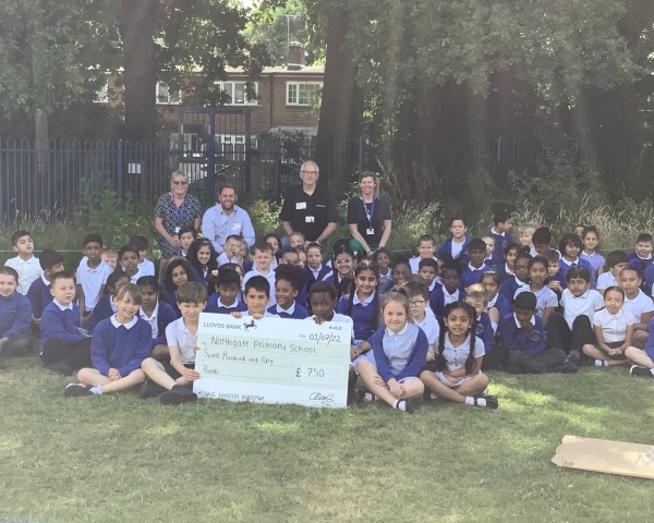 Cheque presentation - large group.jpg